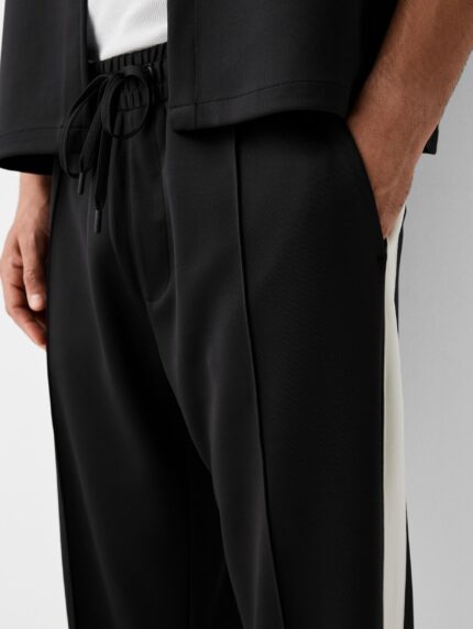 Interlock trousers with side stripes