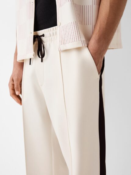 Interlock trousers with side stripes